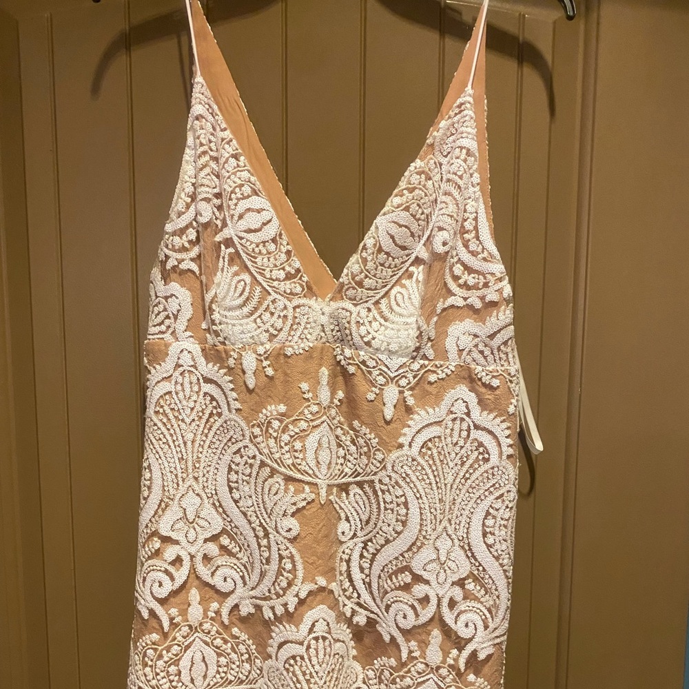 Free people white beaded mini dress.